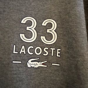 Lacoste Men’s polo shirt charcoal grey with cream writing, sz. 3xl
